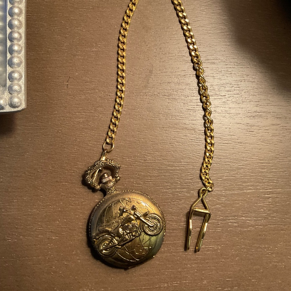 Vintage Pocket Watch with Motorcycle Design